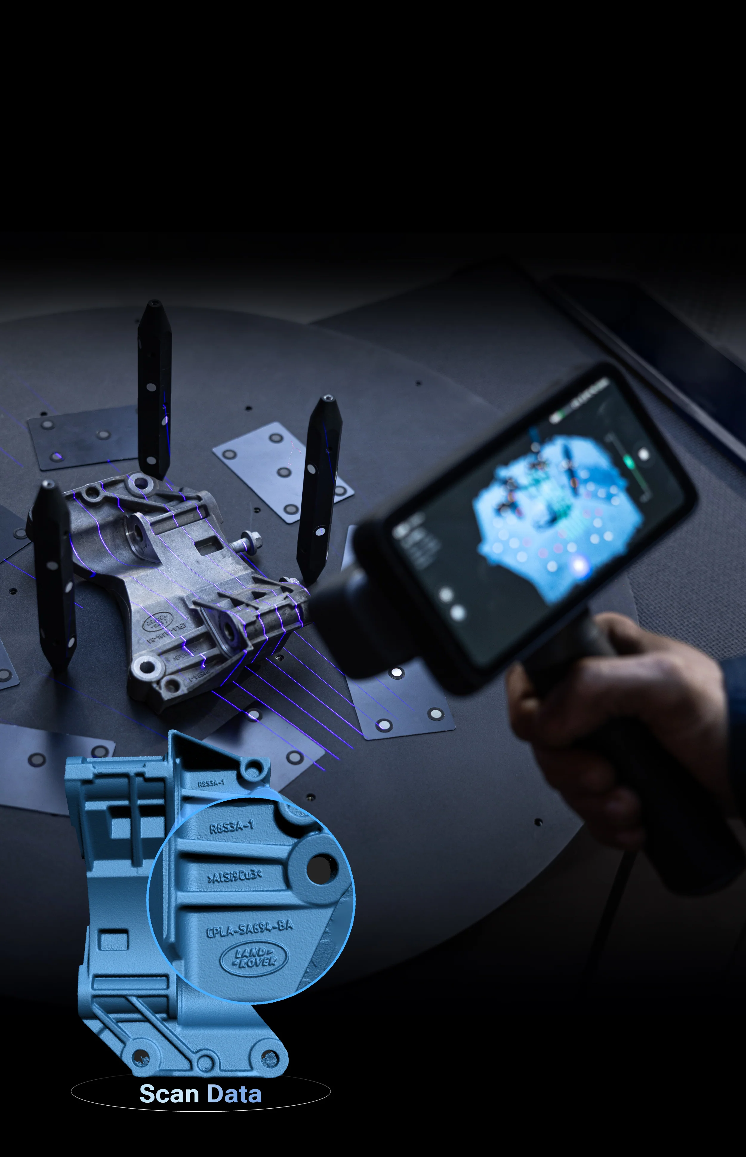 Handheld 3D scanner capturing a Land Rover bracket, with the resulting scan-data mesh